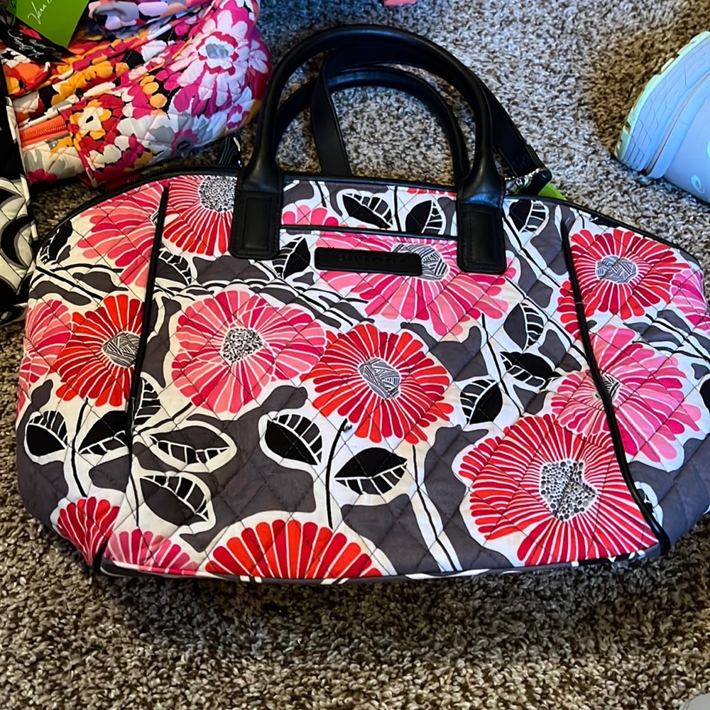 This purse is size medium brand new with tags